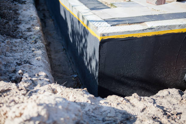 Professional Basement Waterproofing technician working in Butler, PA